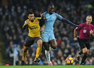 Manchester City V Arsenal 2016-17 Prints: Clash of Midfield Titans: Coquelin vs Yaya Toure - Manchester City vs Arsenal