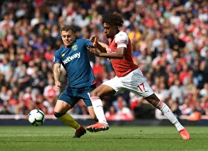 Arsenal V West Ham United 2018-19 Prints: Clash of Midfield Titans: Iwobi vs
