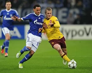 Schalke 04 v Arsenal 2012-13 Collection: Clash of Midfield Titans: Jack Wilshere vs. Jermaine Jones - Schalke 04 vs