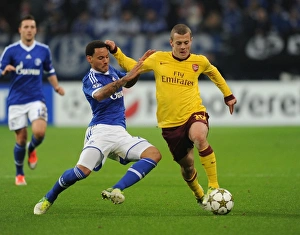 Schalke 04 V Arsenal 2012-13 Prints: Clash of Midfield Titans: Jack Wilshere vs
