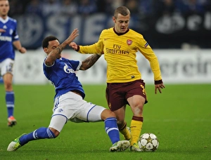Schalke 04 V Arsenal 2012-13 Prints: Clash of Midfield Titans: Jack Wilshere vs