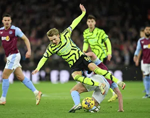 Aston Villa V Arsenal 2023-24 Prints: Clash of Midfield Titans: Martin Odegaard vs