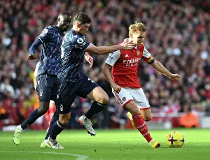 Clash of Midfield Titans: Odegaard vs McKenna - Arsenal's Showdown against Nottingham Forest (2022-23)