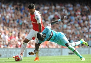 Arsenal V West Ham United 2015-16 Prints: Clash of the Midfield Titans: Oxlade-Chamberlain vs