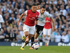 Tottenham Hotspur V Arsenal 2013-14 Prints: Clash of Midfield Titans: Oxlade-Chamberlain vs