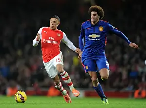 Arsenal V Manchester United 2014-15 Prints: Clash of Midfield Titans: Oxlade-Chamberlain vs Fellaini (Arsenal vs Manchester United)