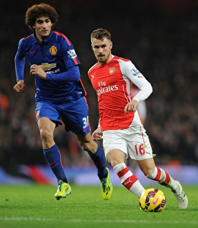 Arsenal V Manchester United 2014-15 Prints: Clash of Midfield Titans: Ramsey vs. Fellaini (Arsenal vs. Manchester United, 2014-15)