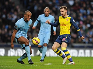 Manchester City V Arsenal 2014-15 Prints: Clash of Midfield Titans: Ramsey vs. Kompany - Manchester City vs. Arsenal, Premier League
