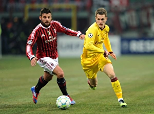 AC Milan V Arsenal 2011-12 Prints: Clash of Midfield Titans: Ramsey vs
