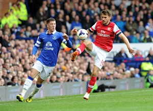 Everton Prints: Clash of Midfield Titans: Ramsey vs
