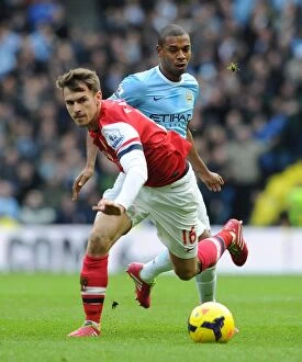 Manchester City Collection: Clash of the Midfield Titans: Ramsey vs Fernandinho, Premier League 2013-14 - Manchester City vs