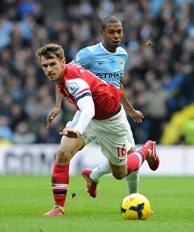 Manchester City V Arsenal 2013-14 Prints: Clash of the Midfield Titans: Ramsey vs Fernandinho