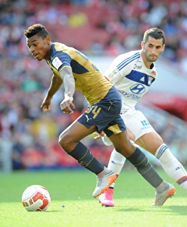 Arsenal V Olympique Lyonnais - Emirates Cup 2015/16 Prints: Clash of Midfield Titans: Reine-Adelaide vs Gonalons (Arsenal vs Olympique Lyonnais)