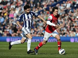 Images Dated 6th April 2013: Clash of Midfield Titans: Rosicky vs. Yacob, Arsenal vs. West Bromwich Albion