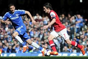 Images Dated 22nd March 2014: Clash of Midfield Titans: Rosicky vs. Matic - Premier League Showdown (2013-14)