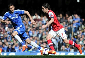 Chelsea V Arsenal 2013-14 Prints: Clash of Midfield Titans: Rosicky vs. Matic - Premier League Showdown (2013-14)