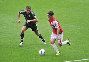 Arsenal v Liverpool 2011-2012 Collection: Clash of Midfield Titans: Samir Nasri vs. Jordan Henderson (Arsenal vs. Liverpool, 2011-2012)