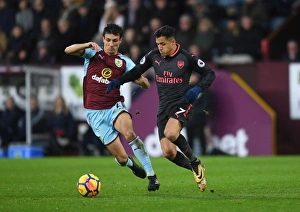 Burnley V Arsenal 2017-18 Prints: Clash of Midfield Titans: Sanchez vs. Cork, Burnley vs. Arsenal, 2017-18 Premier League