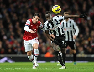 Arsenal V Newcastle United 2012-13 Prints: Clash of Midfield Titans: Santi Cazorla vs