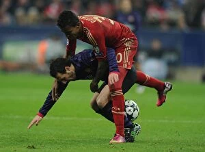 German Soccer League Collection: Clash of Midfield Titans: Santi Cazorla vs. Luiz Gustavo - Bayern Munich vs