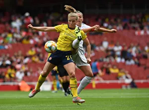 Clash of Midfield Titans: Tabea Kemme vs. Melanie Leupolz at the Emirates Cup