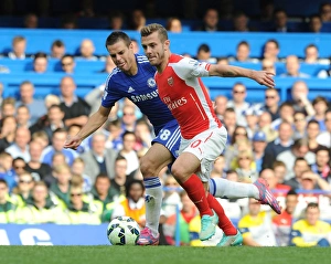Chelsea V Arsenal 2014-15 Prints: Clash of Midfield Titans: Wilshere vs. Azpilicueta - Premier League Showdown, 2014-15