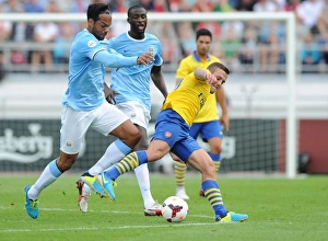 Arsenal V Manchester City Pre Season 2013-14 Prints: Clash of Midfield Titans: Wilshere vs