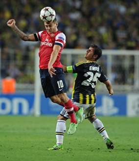 Clash of Midfield Titans: Wilshere vs. Belozoglu - Arsenal vs. Fenerbahce, UEFA Champions League Play-offs, Istanbul, Turkey, 2013
