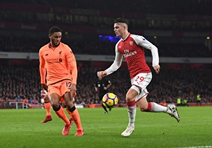 Arsenal V Liverpool 2017-18 Prints: Clash of Midfield Titans: Xhaka vs. Gomez in Arsenal vs. Liverpool Showdown
