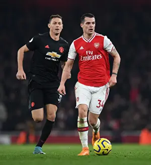 Clash of Midfield Titans: Xhaka vs Matic in Arsenal vs Manchester United Premier League Battle