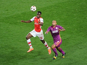 Arsenal V Galatasaray 2014/15 Champions League Prints: Clash of the Midfield: Welbeck vs. Melo in the Champions League