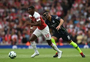 Arsenal V Manchester City 2018-19 Prints: Clash of Midfielders: Ainsley Maitland-Niles vs Ilkay Gundogan (Arsenal v Manchester City)