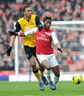 Images Dated 4th February 2012: Clash of Midfielders: Alex Song vs. Steven N'Zonzi - Arsenal v Blackburn Rovers, Premier League