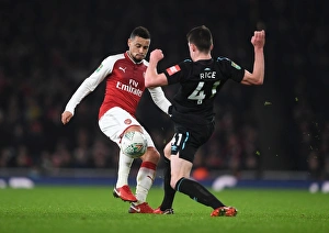 Arsenal V West Ham United - Carabao Cup 2017-18 Prints: Clash of Midfielders: Coquelin vs. Rice in Carabao Cup Showdown