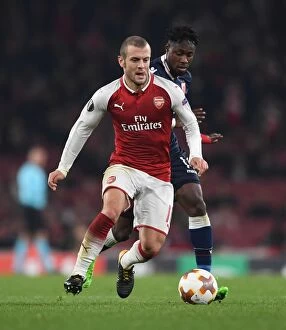 Images Dated 2nd November 2017: Clash of Midfielders: Jack Wilshere vs. Richmond Donald in Arsenal's Europa League Battle