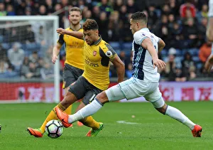 West Bromwich Albion V Arsenal 2016-17 Prints: Clash of Midfielders: Oxlade-Chamberlain vs. Livermore in Arsenal-West Brom Battle