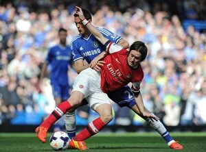 Images Dated 22nd March 2014: Clash of Midfielders: Rosicky vs. Matic - Chelsea vs. Arsenal, Premier League 2013-14