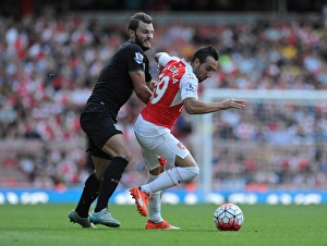 Arsenal V Stoke City 2015-16 Prints: Clash of Midfielders: Santi Cazorla vs