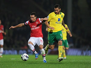 Norwich City V Arsenal 2012-13 Prints: Clash of Midfielders: Santi Cazorla vs