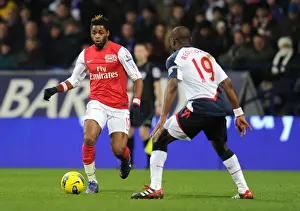 Bolton Wanderers V Arsenal 2011-12 Prints: Clash of Midfielders: Song vs. Reo-Coker - Bolton Wanderers vs. Arsenal, Premier League