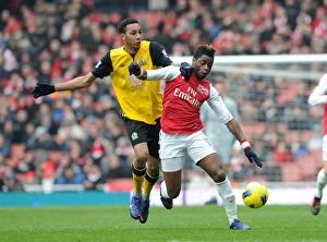 Images Dated 4th February 2012: Clash of Midfielders: Song vs. Zonzi - Arsenal v Blackburn Rovers, Premier League
