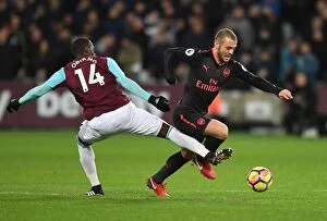 West Ham United v Arsenal 2017-18 Collection: Clash of Midfielders: Wilshere vs. Obiang - West Ham United vs. Arsenal, Premier League 2017-18