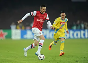 Napoli V Arsenal 2013-14 Prints: Clash in Naples: Jenkinson Outruns Callejon in UEFA Champions League Showdown