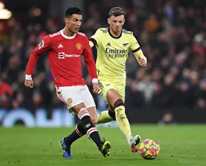 Manchester United V Arsenal 2020-21 Prints: Clash at Old Trafford: Arsenal's White Holds Off Ronaldo in Manchester United vs Arsenal Premier League Showdown