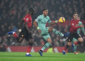 Manchester United v Arsenal 2018-19 Collection: Clash at Old Trafford: Aubameyang vs. Bailly in the Manchester United vs