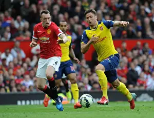 Manchester United V Arsenal 2014-15 Prints: Clash at Old Trafford: Giroud vs Jones - Premier League Showdown, 2014-15