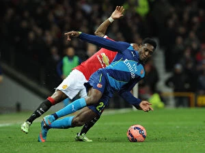 Images Dated 13th February 2009: Clash at Old Trafford: Intense Battle Between Welbeck and Young - FA Cup Quarterfinals