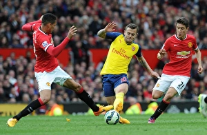 Manchester United V Arsenal 2014-15 Prints: Clash at Old Trafford: Wilshere vs