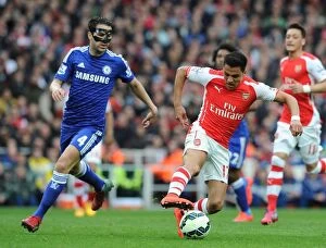 Arsenal v Chelsea 2014/15 Collection: Clash of the Past and Present: Sanchez vs. Fabregas, Arsenal vs. Chelsea