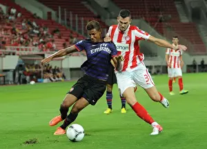 Olympiacos U19 V Arsenal U19 - NextGen 2012:13 Prints: Clash in Piraeus: Angha vs. Lykogiannis in NextGen Series Showdown